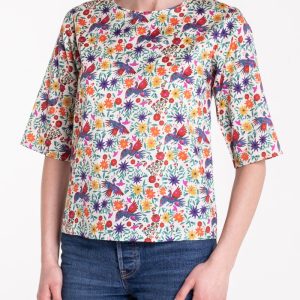 Top con maniche in fantasia bianca